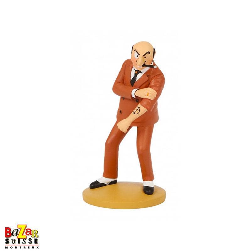 Rastapopoulos with tattoo figurine