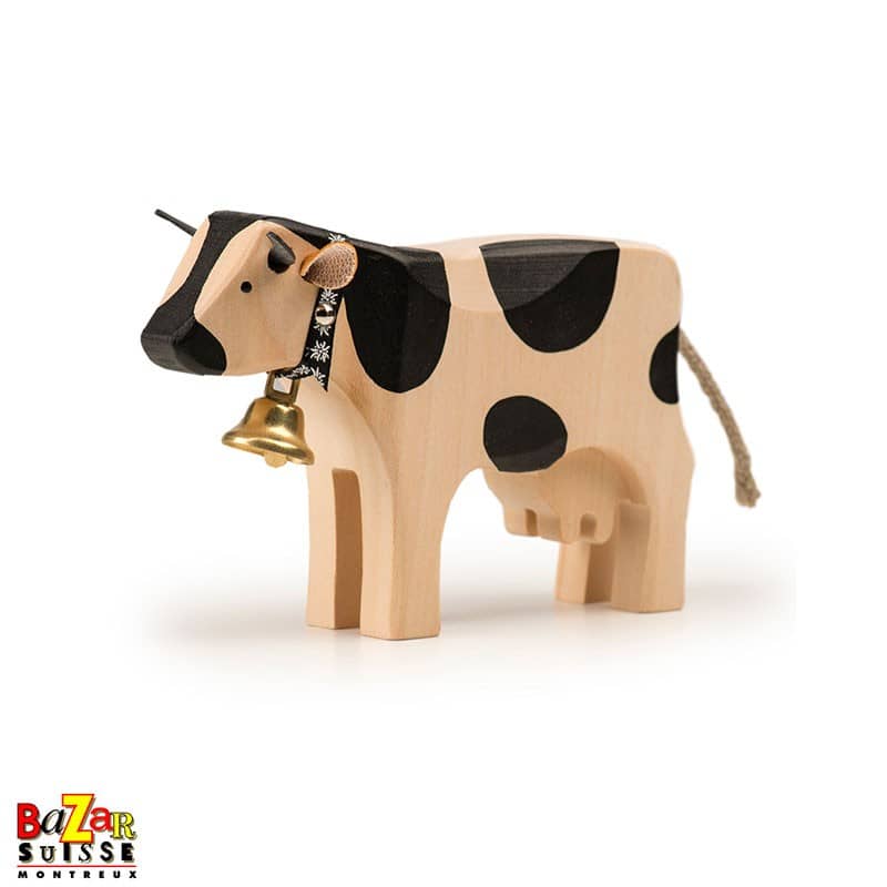 Mucca in legno nera – media